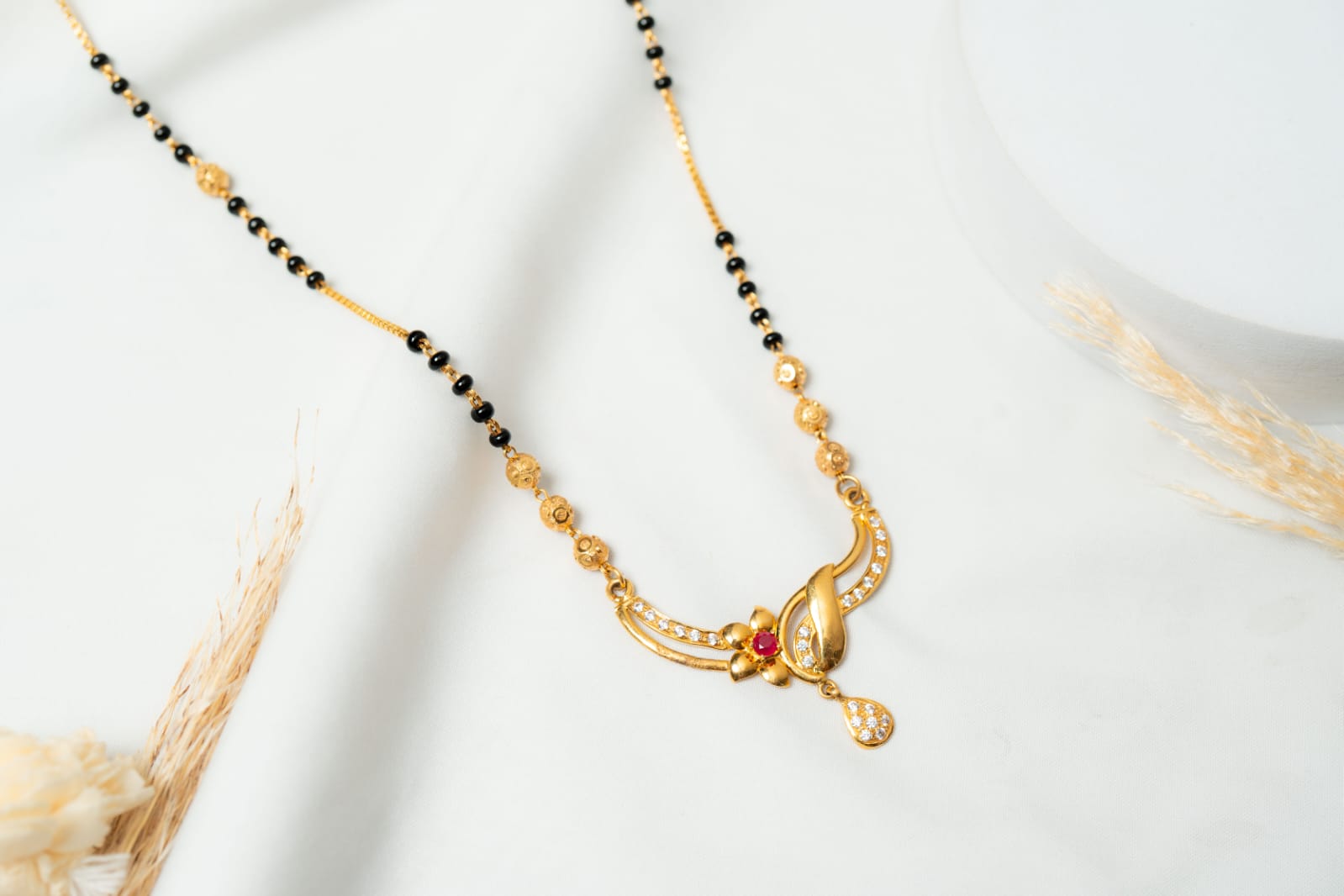 Floral Ruby Accent Curved Bar Mangalsutra - Shagoon Jewellers Nepal